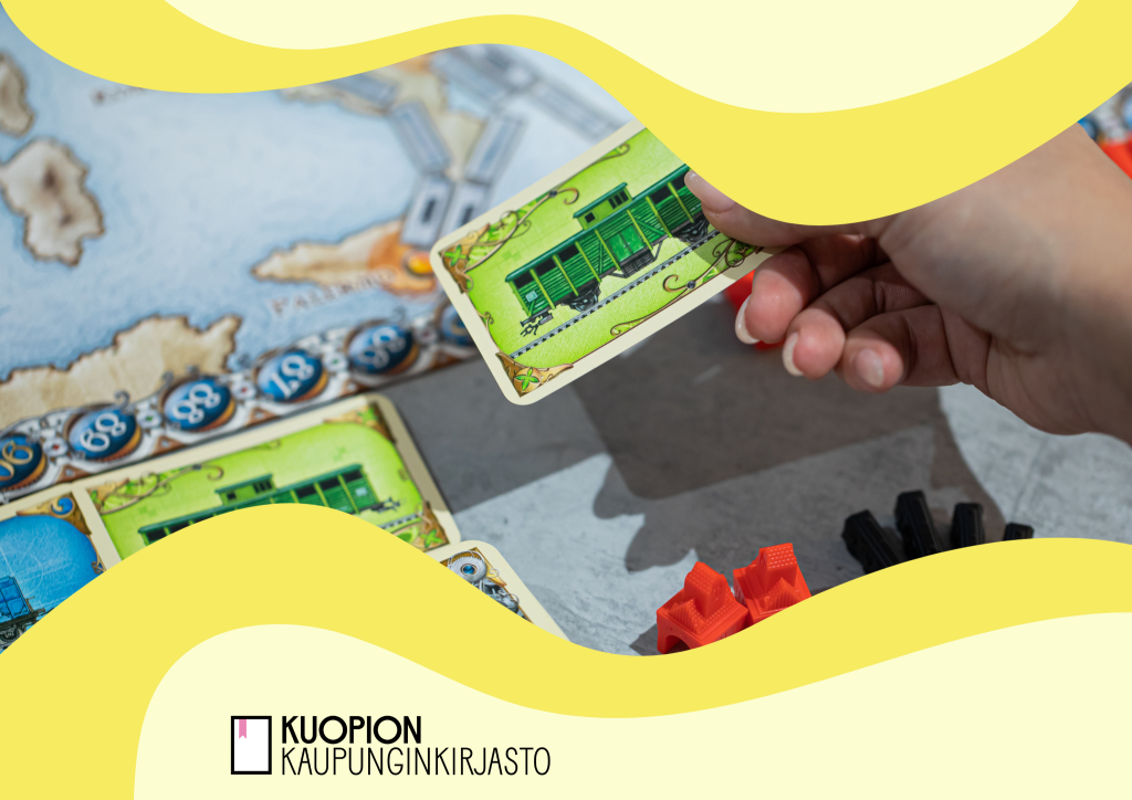 Keltaisissa kehyksissä lähikuva lautapelistä pelaajineen